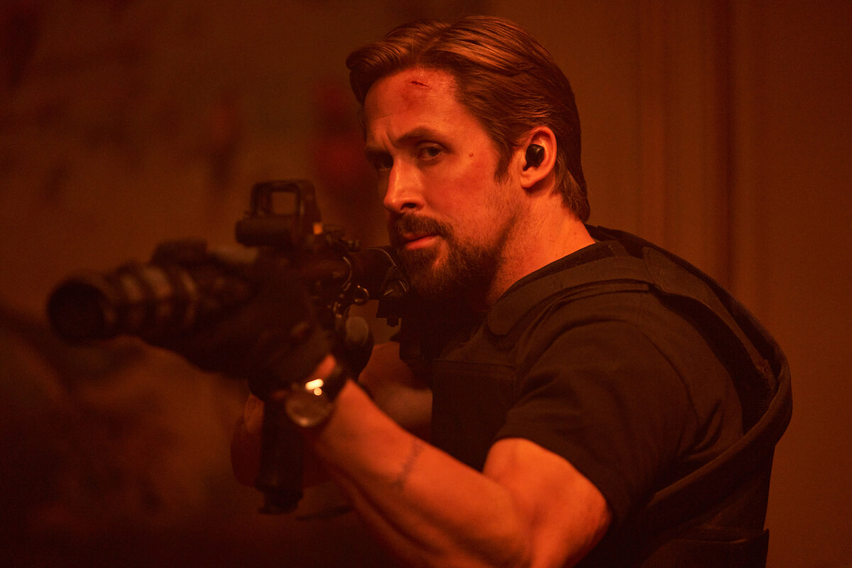 A photo of Ryan Gosling - Ryan Gosling and Chris Evans Play Spy Games in new ‘The Gray Man’ Photos