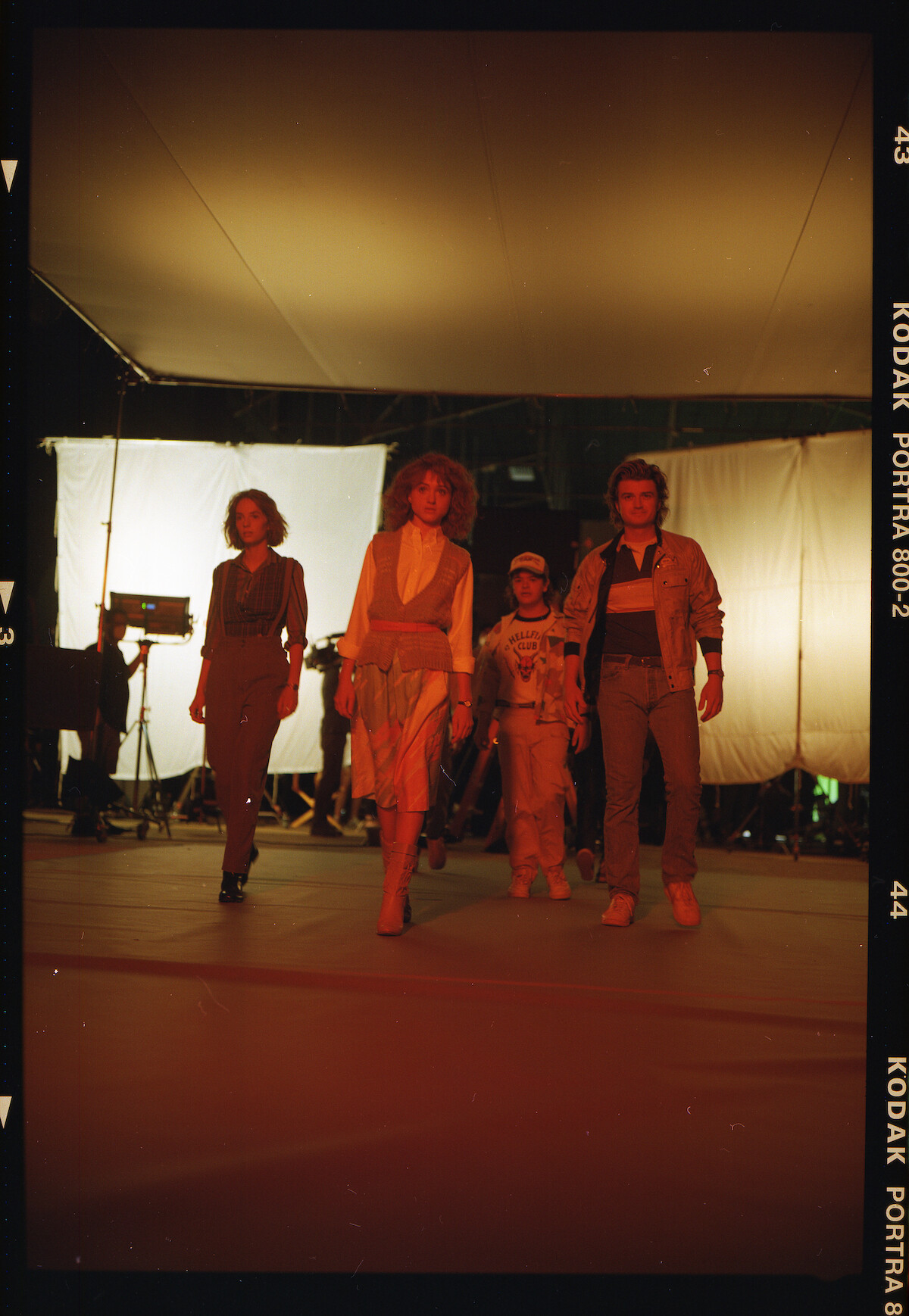 Robin (Maya Hawke), Nancy (Natalia Dyer), Dustin (Gaten Matarazzo) and Steve (Joe Keery) - Go Behind the Scenes of ‘Stranger Things’ Season 4 With These ‘80s Retro Photos
