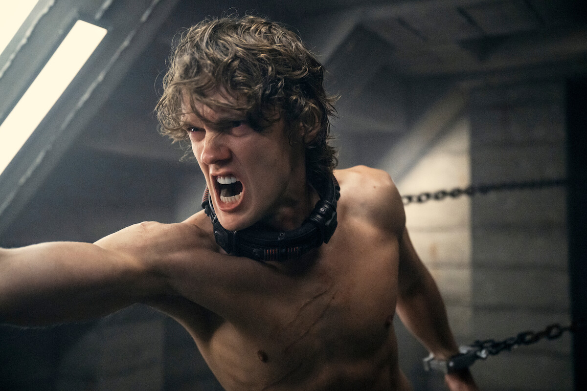 Hunter Doohan as Tyler Galpin chained to a wall in Willow Hill in ‘Wednesday’ Season 2.