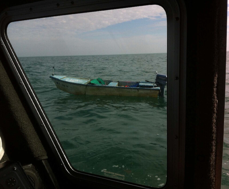 Photo taken from a U.S. Coast Guard vessel pulled up to Pat's Stumpnocker at sea 