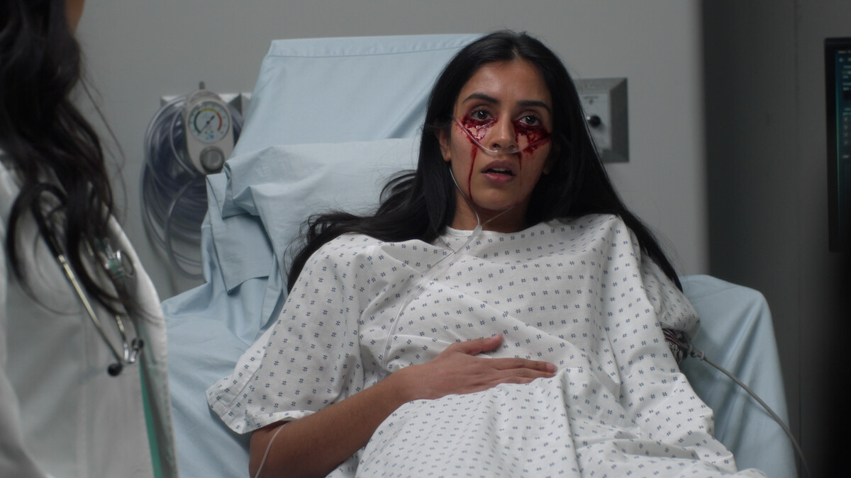 A woman with blood coming out her eyes.