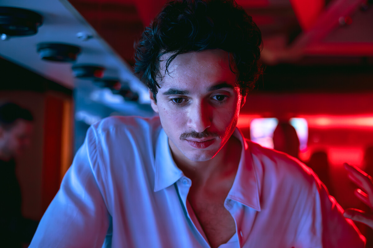 Shahine El-Hamus as Amir starring at a computer screen in ‘Crypto Boy’