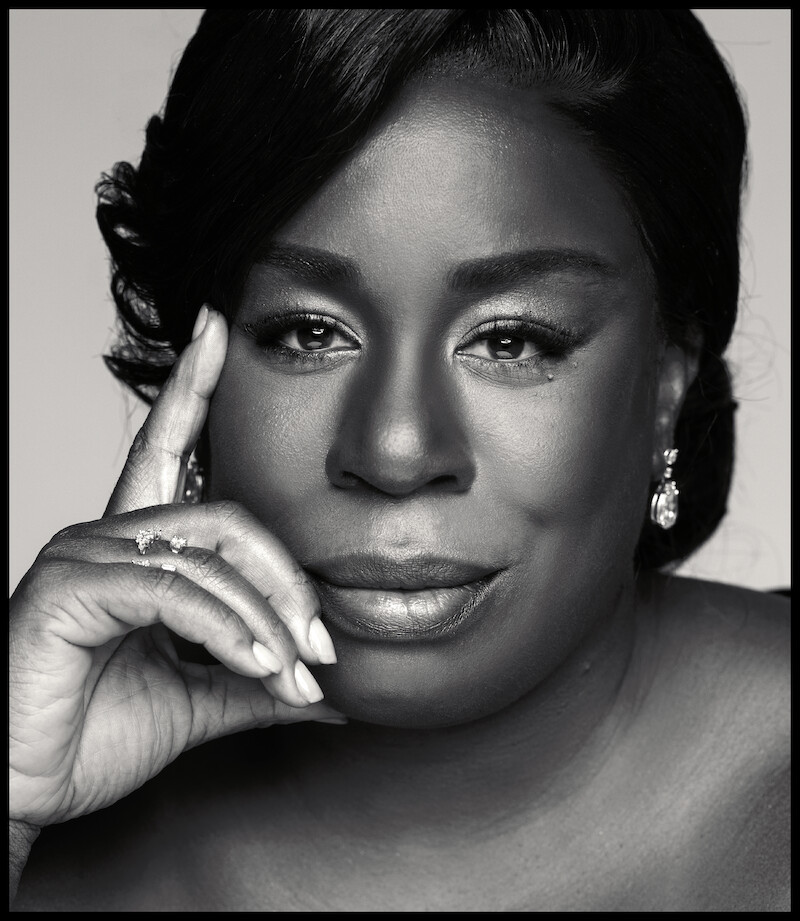 Uzo Aduba poses with her hand  on her chin. 