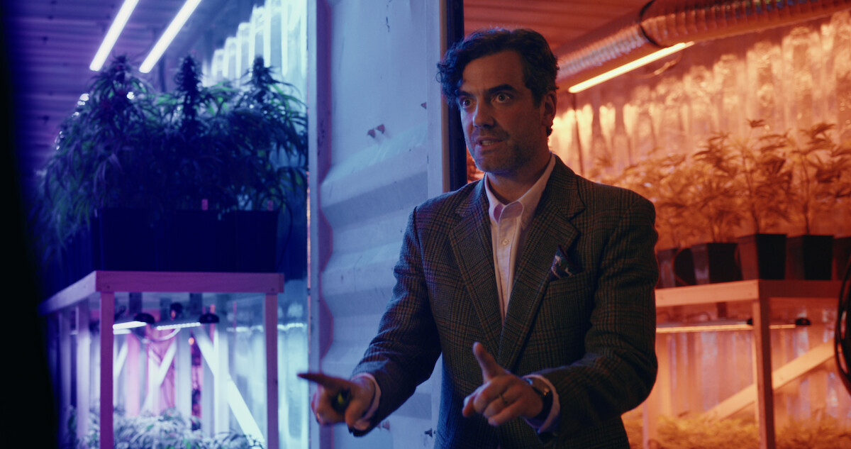 Daniel Ings as Freddy Horniman stands in a grow room with a concerned expression in season 1 of ‘The Gentlemen’