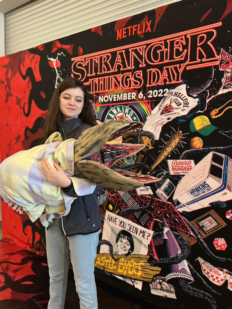 A fan holds her artfully recreated Demogorgon head at the Stranger Things Day screening in Toronto.