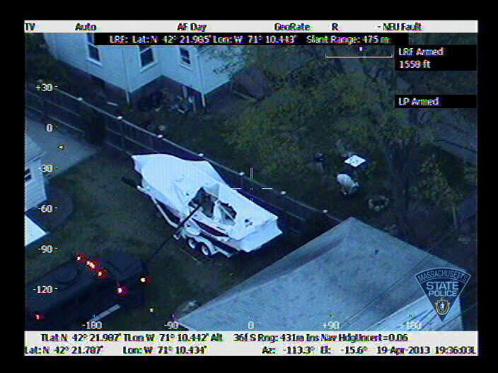 The boat in which Boston Marathon bombing suspect Dzhokhar Tsarnaev was hiding is seen from a police helicopter.