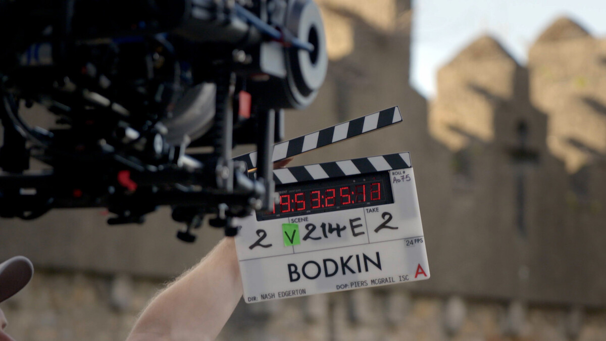 A camera filking a clapboard for 'Bodkin'