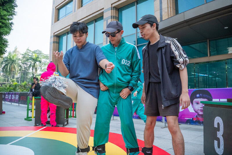 Fans compete during a 'Squid Game' Season 3 event in Jakarta, Indonesia.