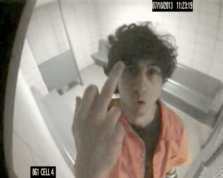 Dzhokhar Tsarnaev is seen giving the middle finger to a security camera inside his jail cell.