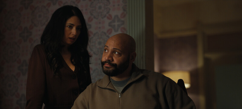 Aarti Mann as Violet Ebner and Colton Dunn as Lester Kitchens in Season 2 of ‘The Recruit’