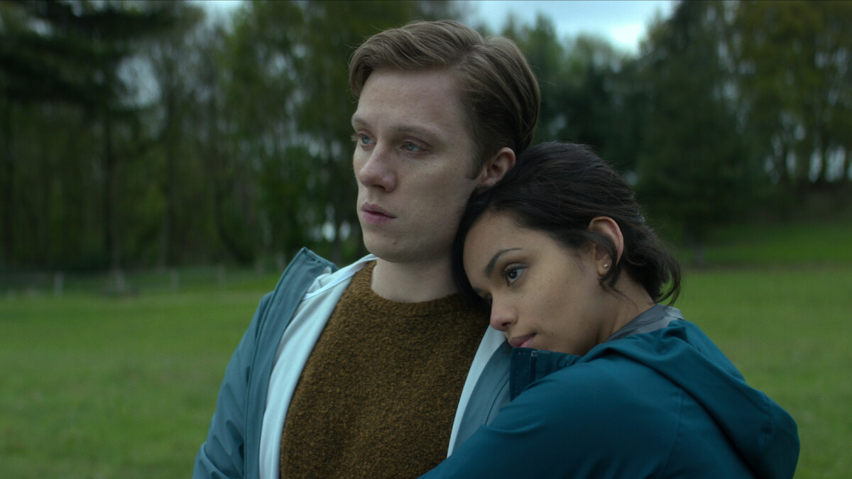 A woman rests her head on a man's shoulder in Season 4 of 'Black Mirror'