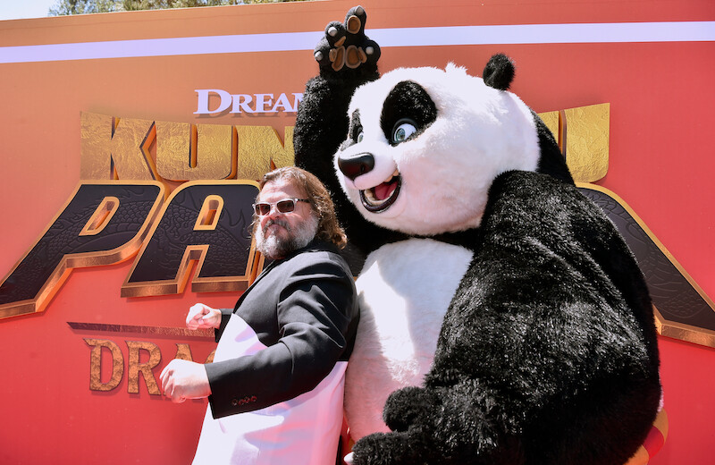 Double trouble: Jack Black and a life-sized Po the Panda strike a pose on the red carpet