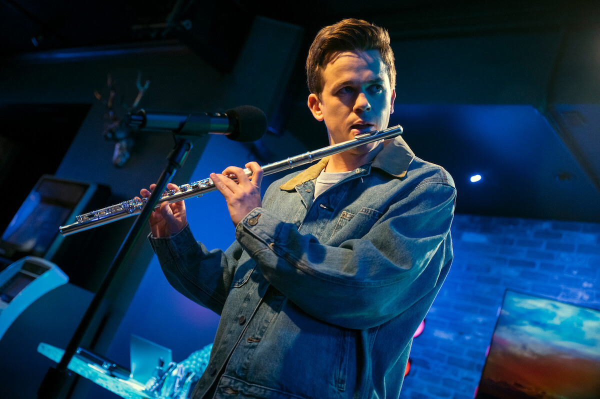 John Owen Lowe as Jackson playing the flute  in Episode 1 of Unstable Season 1