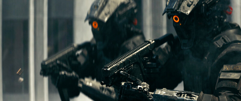 Two policemen in full body armor hold guns in 'Code 8'