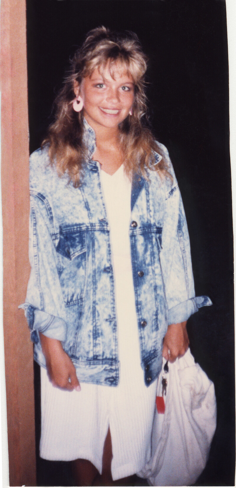 Pamela in a denim jacket.