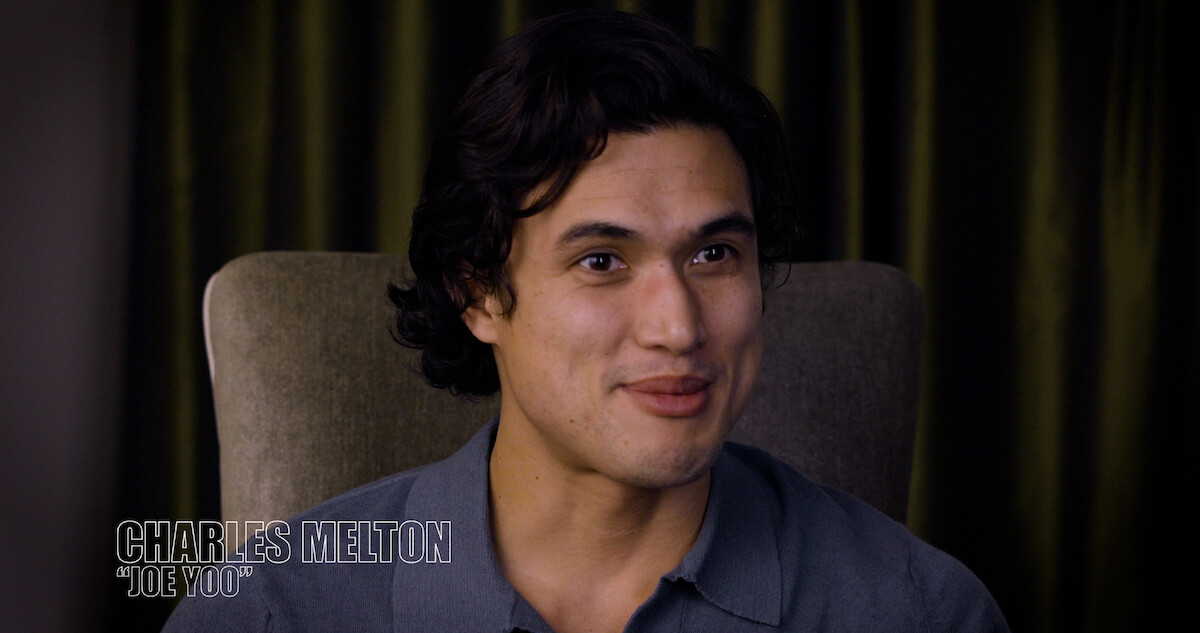 Charles Melton as "Joe Woo"