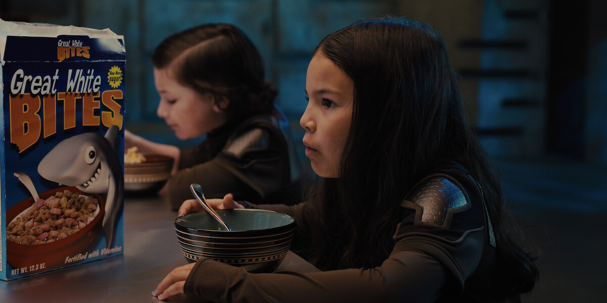  Connor Esterson as Tony Tang-Torrez and Everly Carganilla as Patty Tango-Torrez start their morning off with bowls of Great White Bites in 'Spy Kids: Armageddon.'