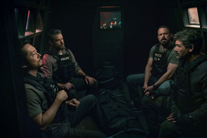Steven Yeun, Matt Damon, Ben Affleck, and Kyle Chandler in 'The Rip.' 