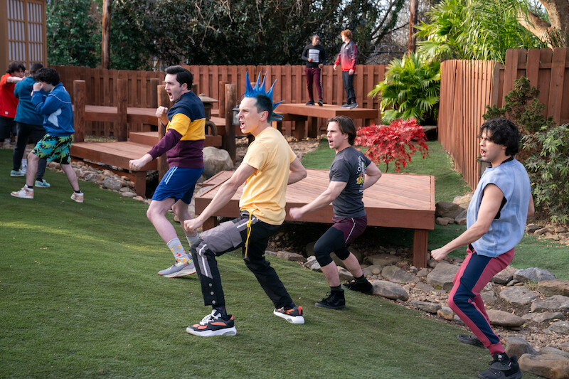 Gianni DeCenzo as Demetri, Jacob Bertrand as Eli 'Hawk' Moskowitz, Tanner Buchanan as Robby Keene, and Xolo Maridueña as Miguel Diaz train together in Season 6 of 'Cobra Kai.'