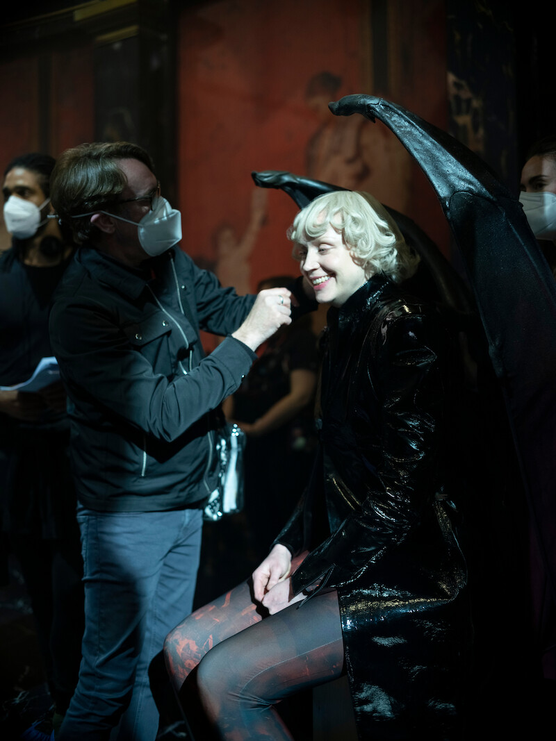 Lucifer (Gwendoline Christie) gets a touch-up on the set of Hell.