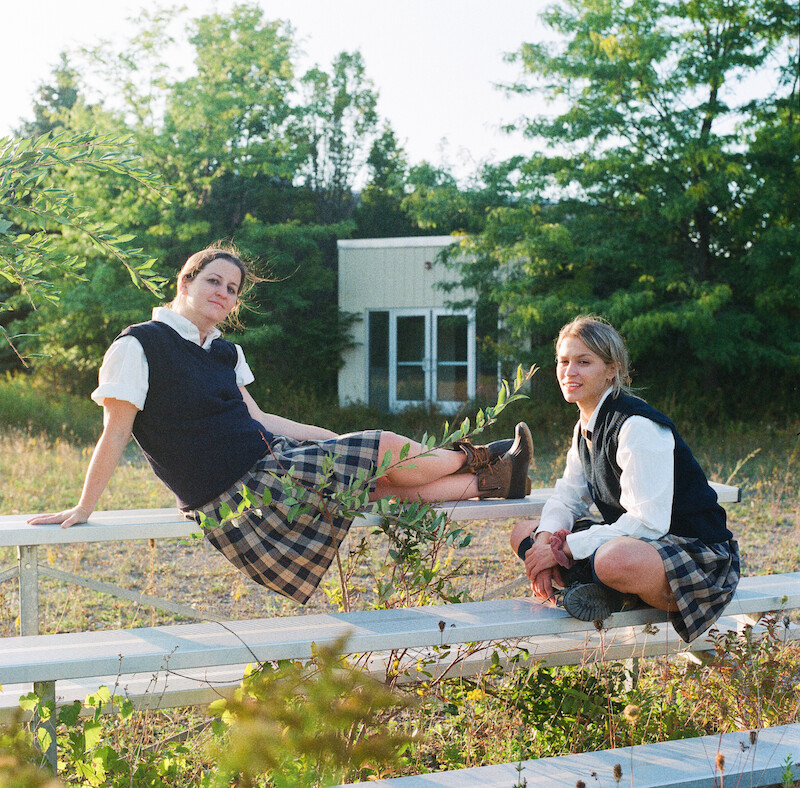 Katherine Kubler sitting outside Ivy Ridge with a friend. 