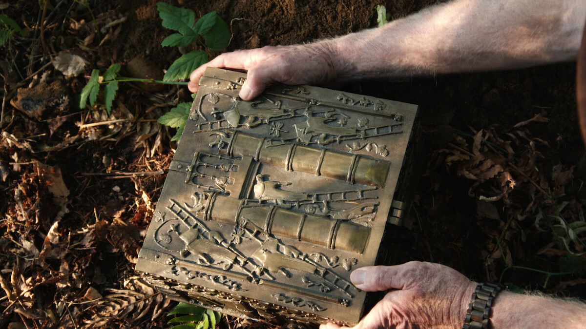 Hands holding a treasure chest
