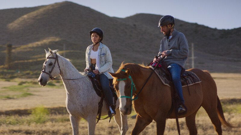 two people on horseback
