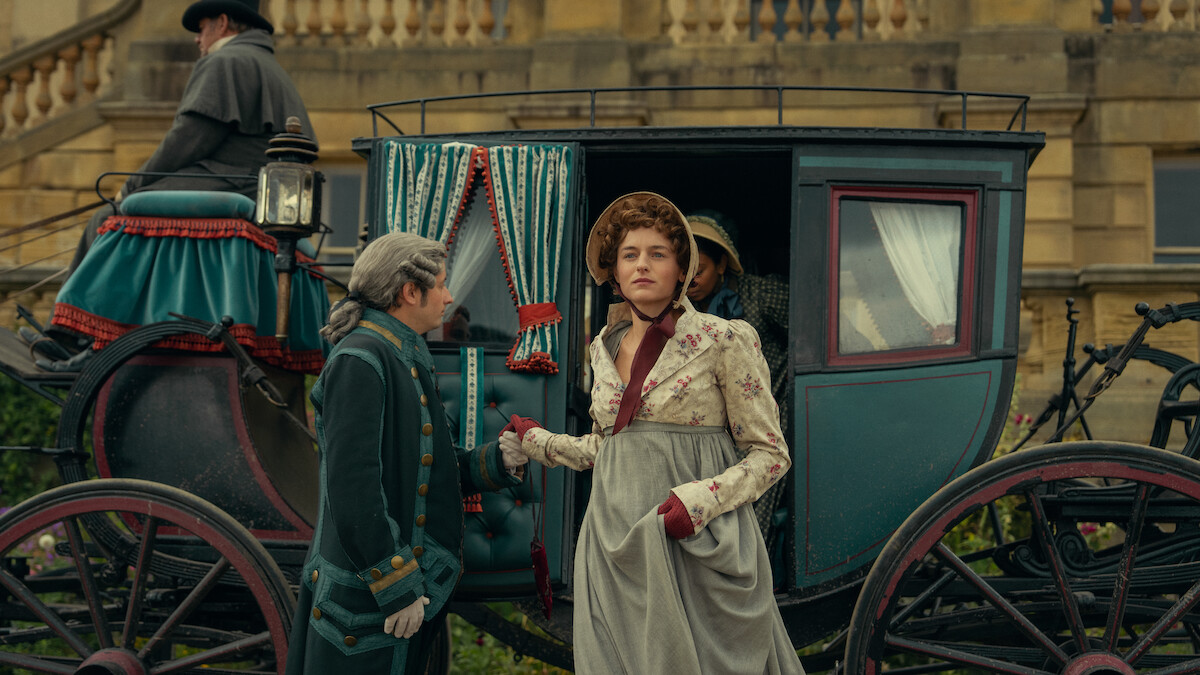 Woman in period clothing steps out of a vintage horse-drawn carriage, assisted by a footman, in front of an elegant stone building with stairs and balustrades, evoking an 18th-century historical setting.