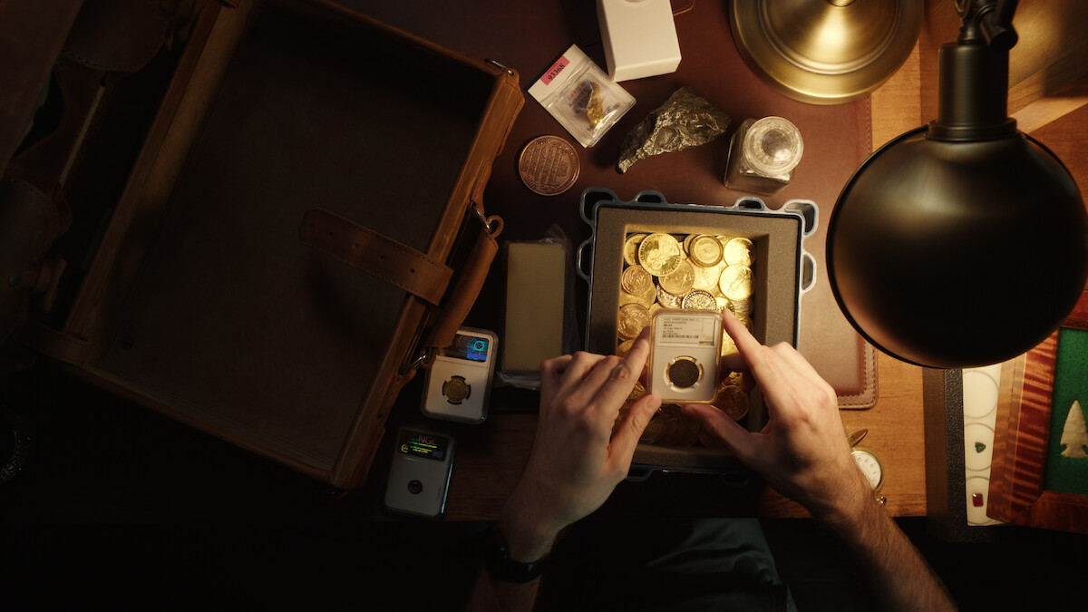 Gold coins examined on a table
