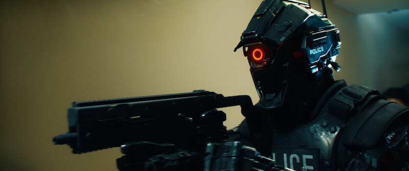 A policeman full body armor hold guns in 'Code 8'