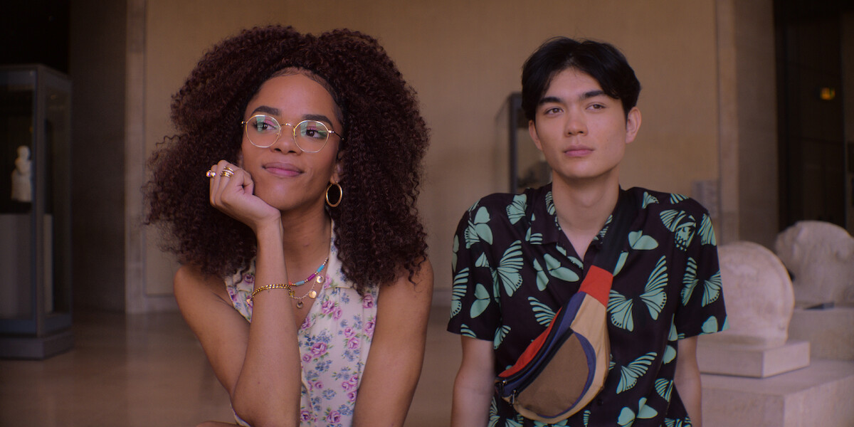 Yasmin Finney as Elle and William Gao as Tao sit together in a museum in Season 2 of ‘Heartstopper.’