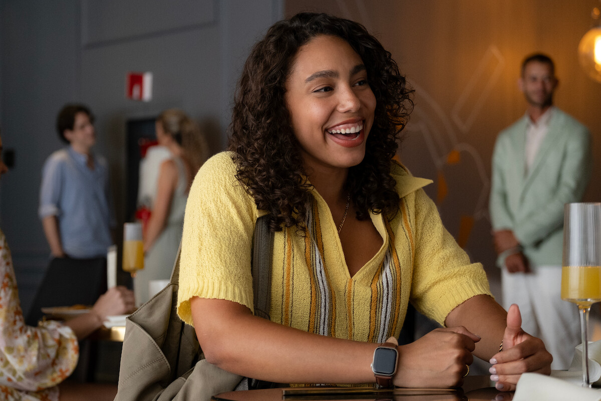 Emma Ferreira as Ness smiles in Season 1 of ‘Neon.’