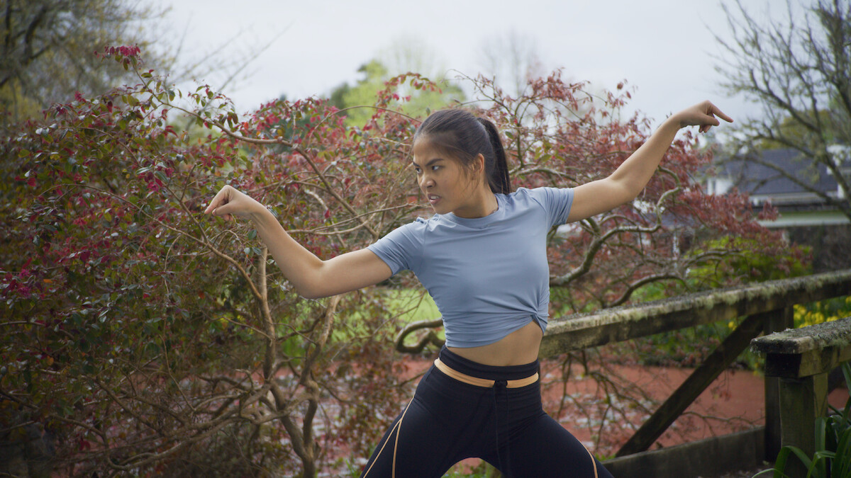Minh (Charlie Kersh) practices mantis style kung fu.