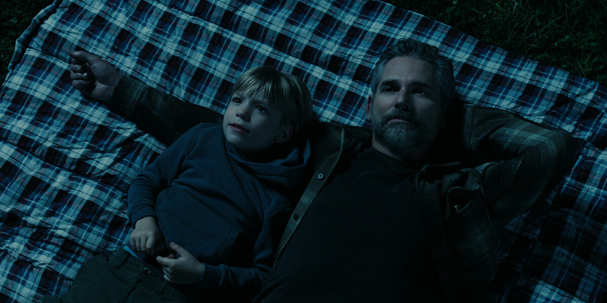 Ezra Wilson as Caleb Turner and Eric Bana as Kyle Turner in ‘UNTAMED.’