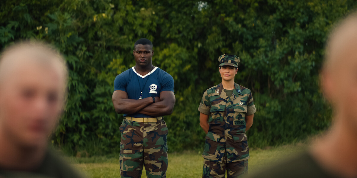 Cedrick Cooper as Sgt. McKinnon and Ana Ayora as Captain Fajaro in ‘BOOTS’