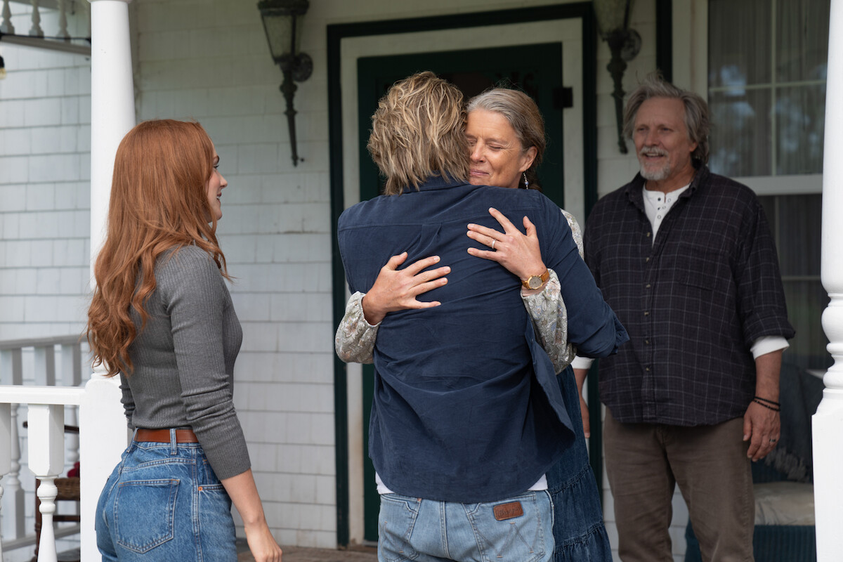 Chad Michael Murray as Cal hugs his mom TK in a production still from ‘Sullivan’s Crossing’.