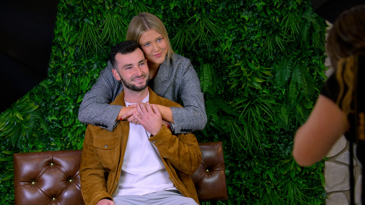 Hannah and NIck hug.