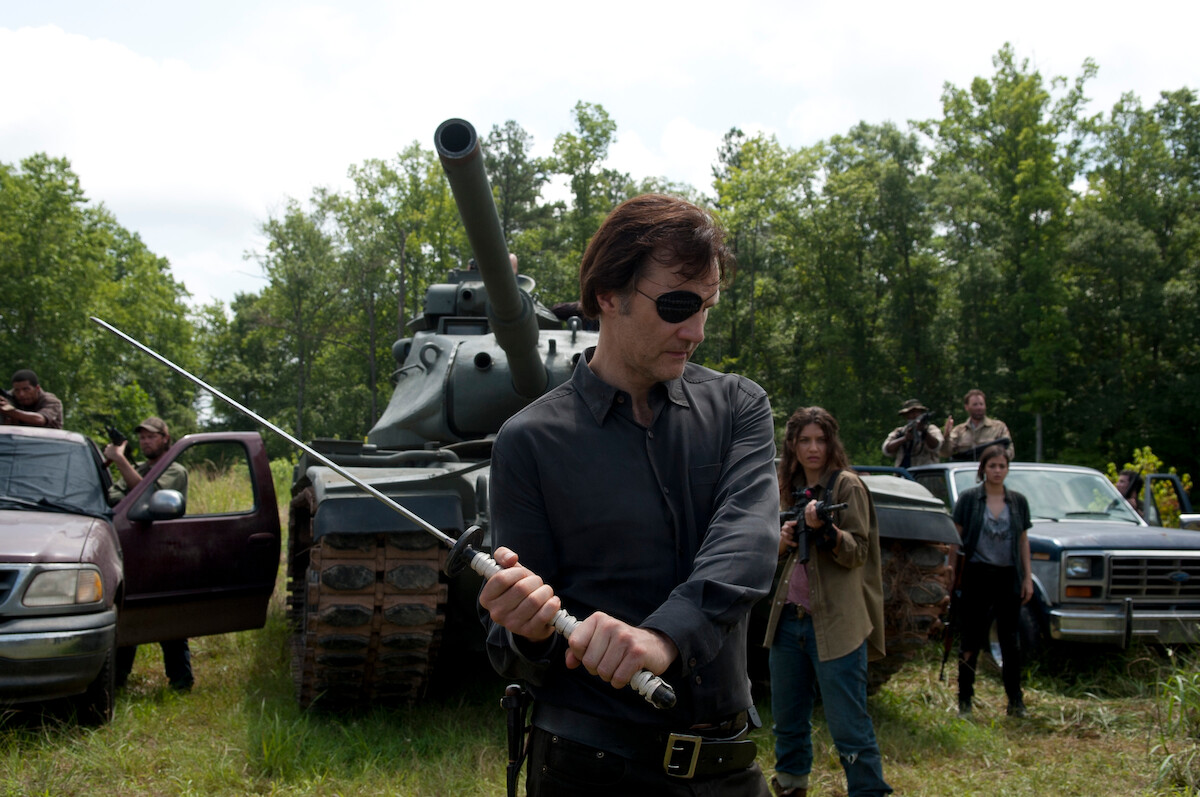 The Governor swings a sword
