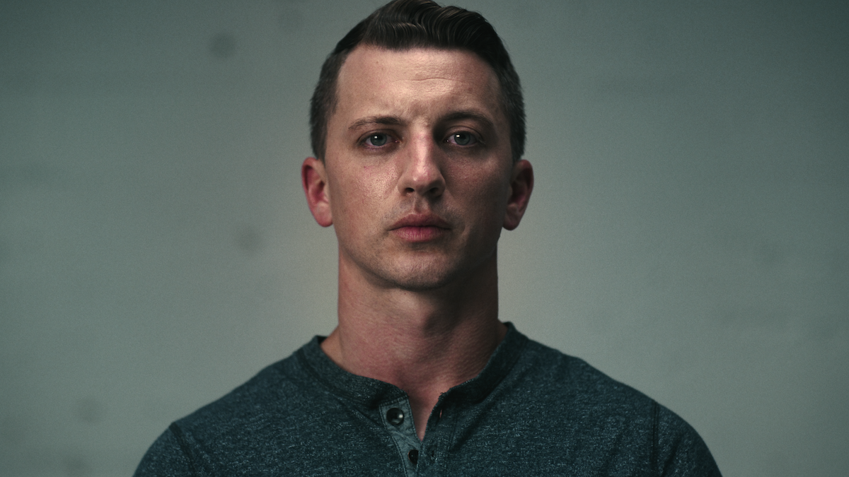Aaron Quinn looks into the camera.