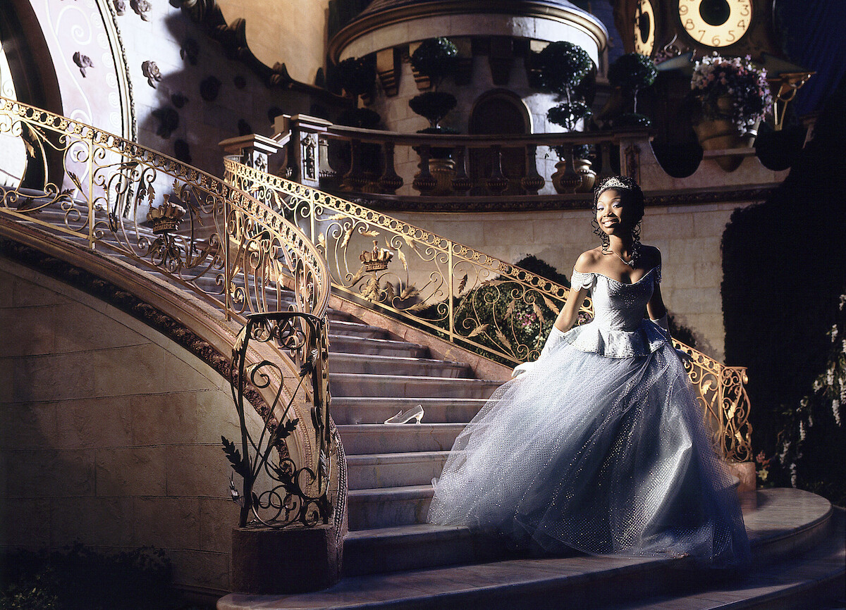 Cinderella running down the stairs of the palace