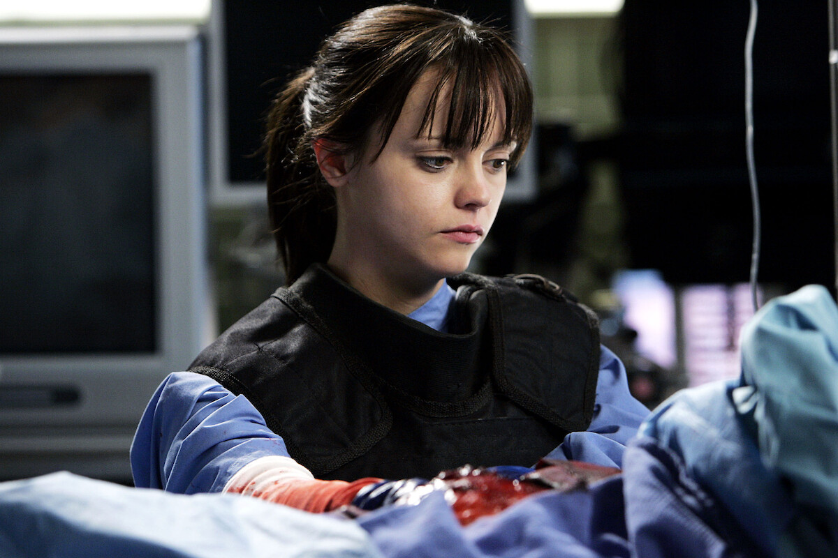 A doctor attends to her patient. 