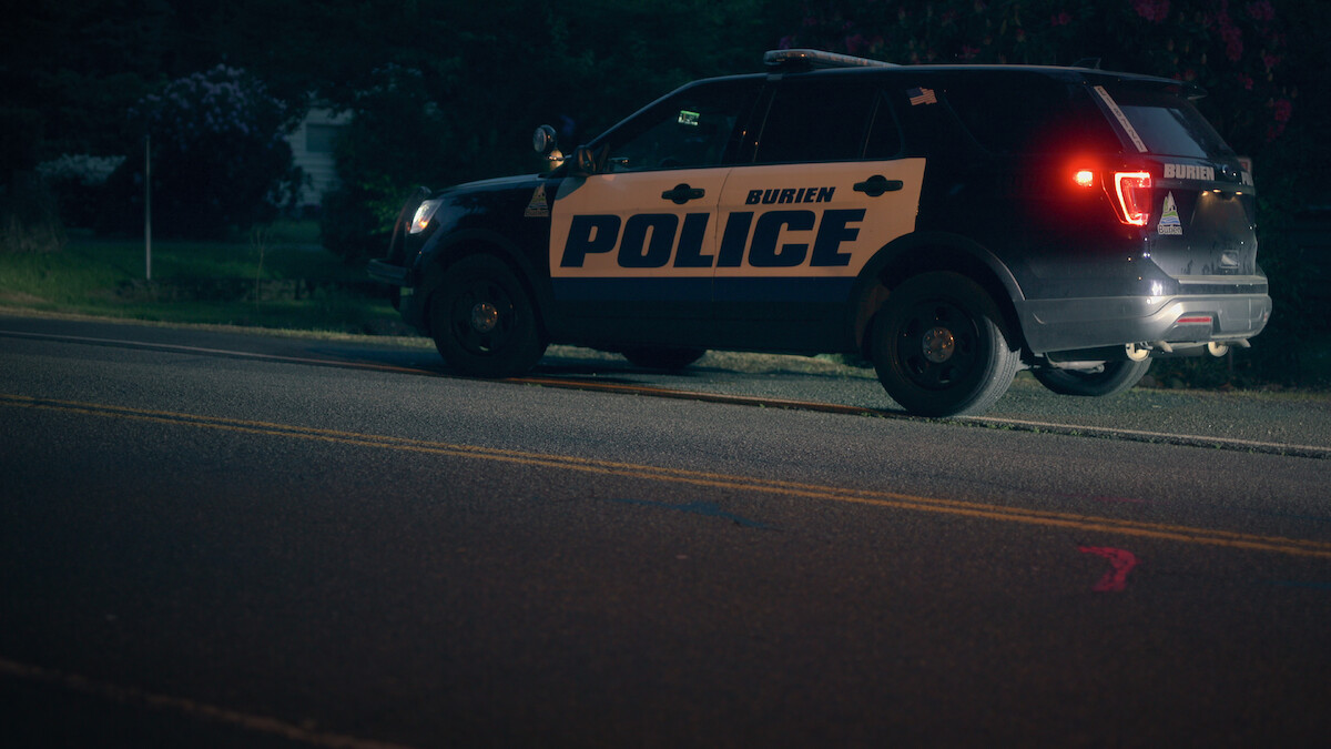 A police car on the street in ‘Worst Roommate Ever’ Season 2