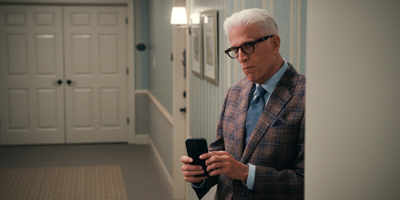 Ted Danson as Charles subtly takes a photo on his phone in Season 1 of 'A Man on the Inside'