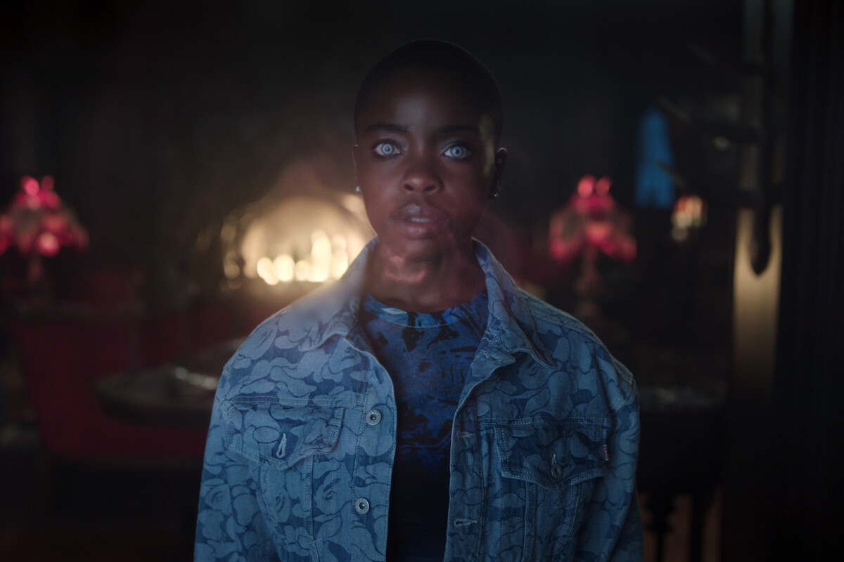 Joy Sunday as Bianca Barclay stands in a dark room in Season 2 of ‘Wednesday’