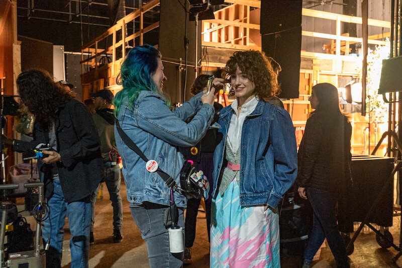 Natalia Dyer stops for a touch-up in between battles with Vecna  - 68 Behind-the-Scenes pics from ‘Stranger Things’ Season 4 You Have to See Slideshow
