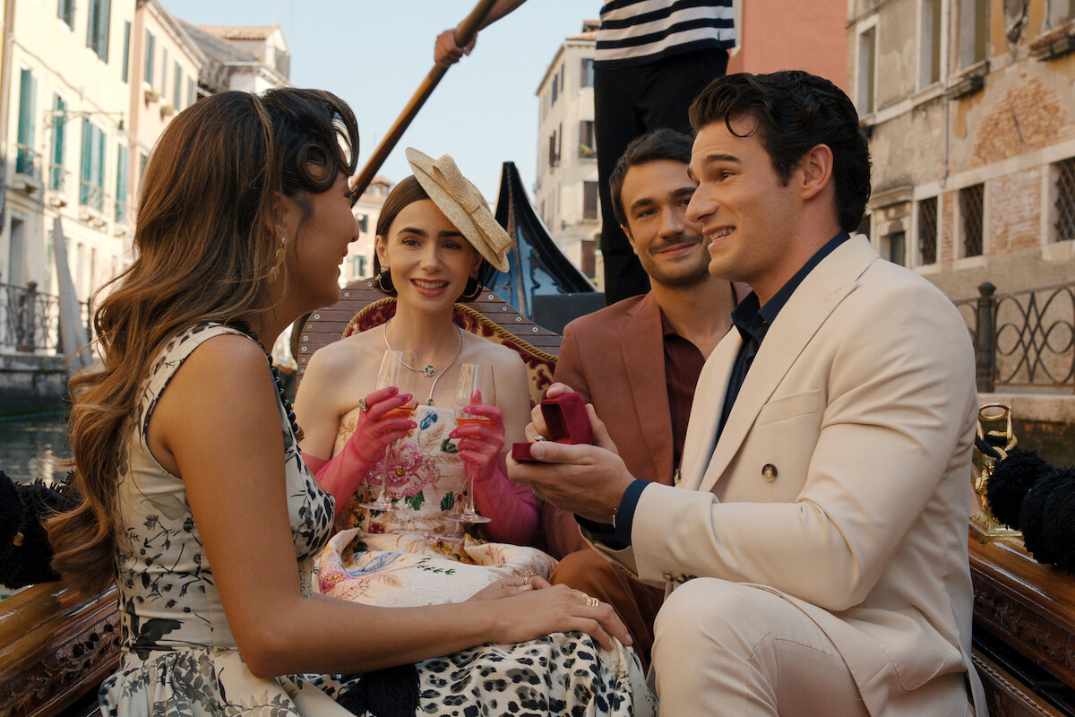 Ashley Park as Mindy, Lily Collins as Emily, Eugenio Franceschini as Marcello and Paul Forman as Nicolas De Leon in ‘Emily in Paris’ Season 5.