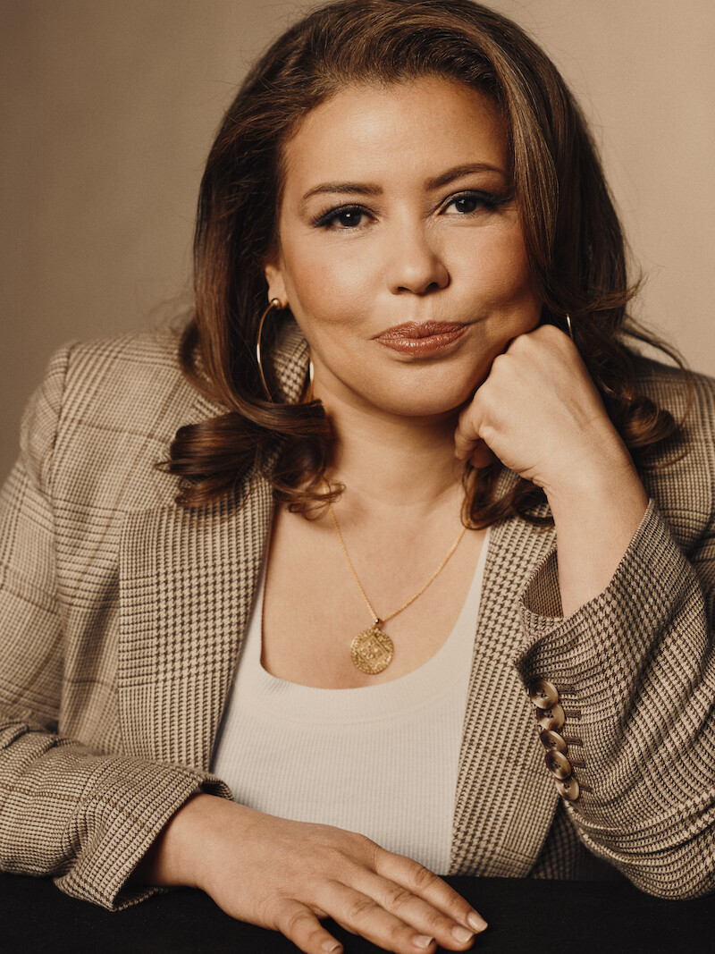 Justina Machado poses in a glam shoot. 