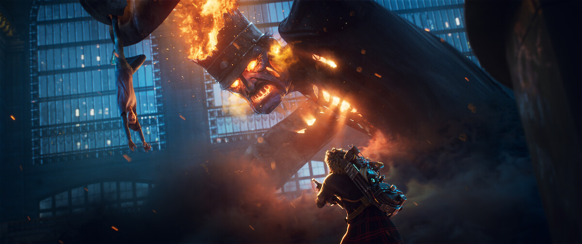 A warrior confronts a towering, fiery-headed monster with glowing eyes inside a large, dim industrial building, dramatic lighting and smoke filling the tense scene.