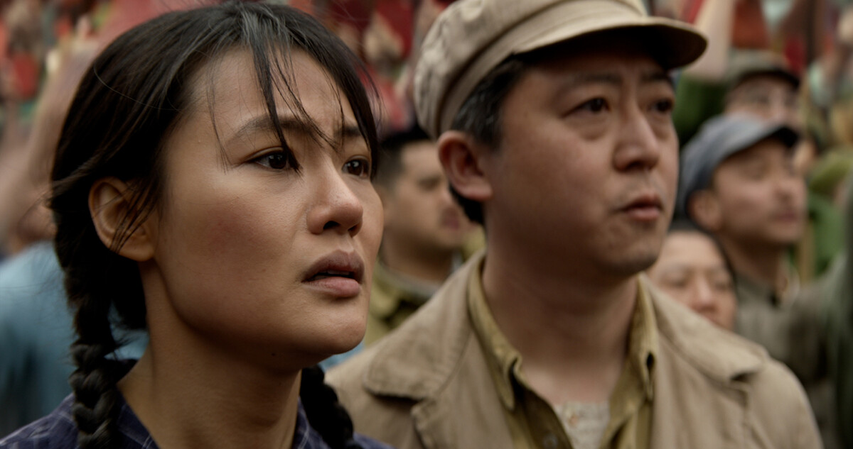 Film still of two actors from the opening sequence of '3 Body Problem'