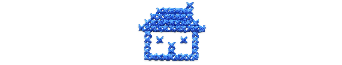 Blue cross stitched house.